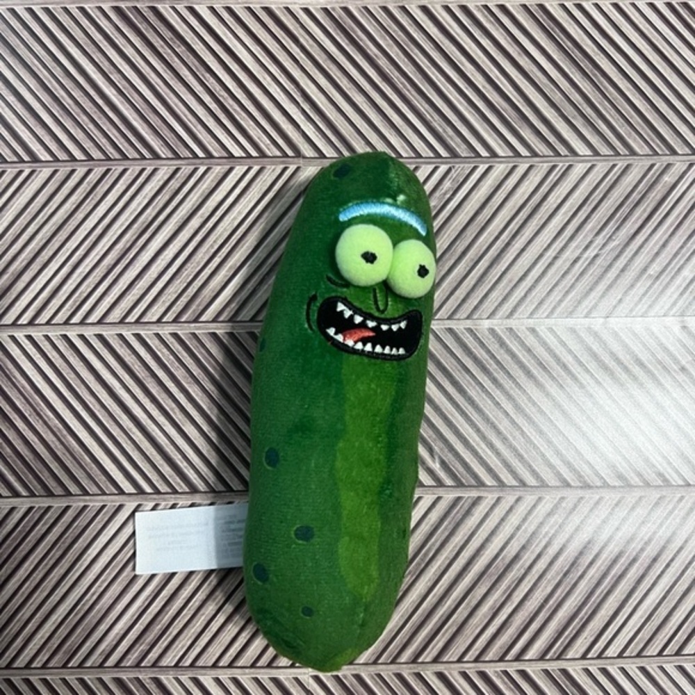 Funko Galactic Plushies Pickle Rick from the animated TV series Rick and Morty.